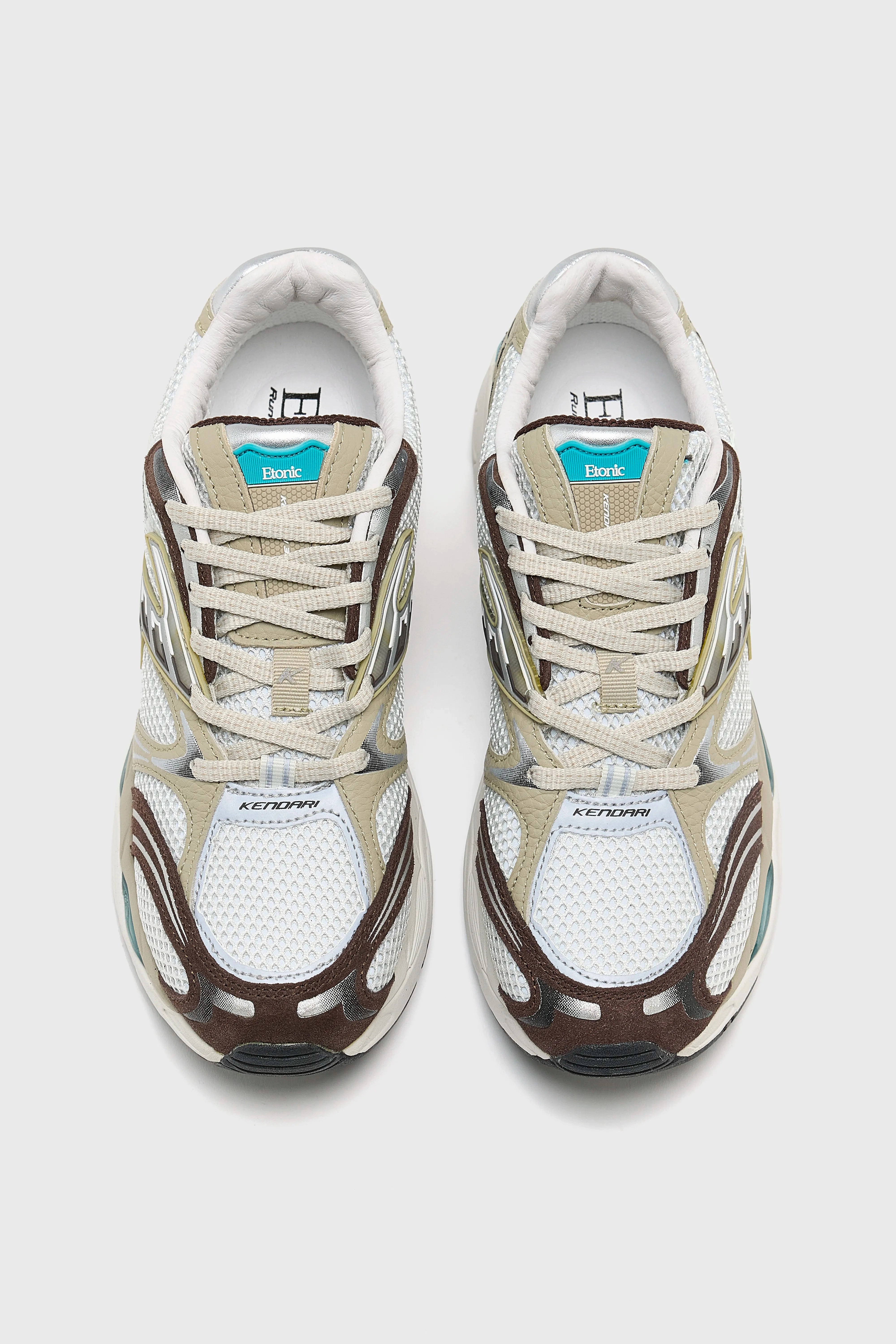 Kendari Jupiter for Women  (252 / W / BEIGE) running in a sidewalk area shoes