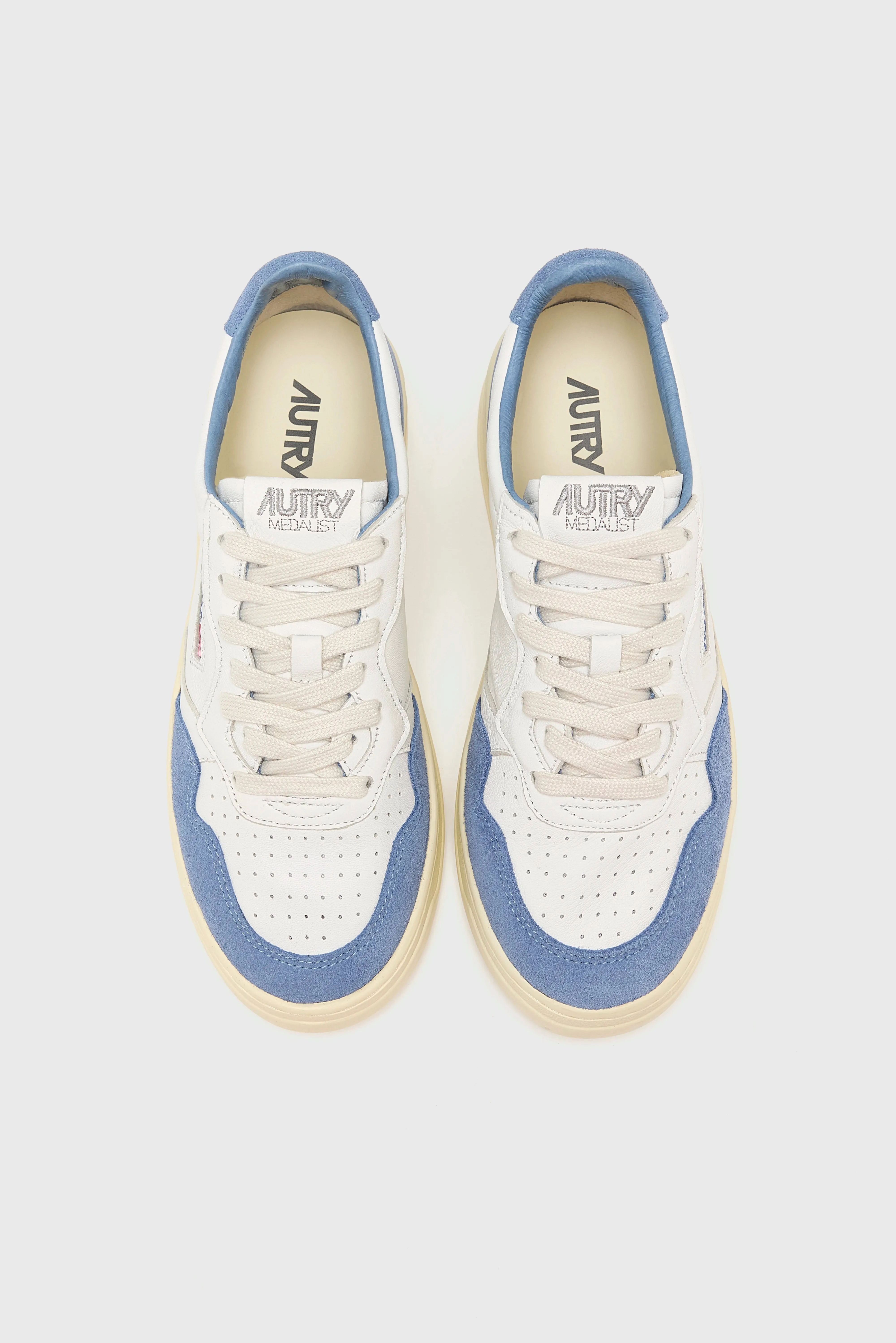 Medalist Low for Women  (252 / W / PALE BLUE) running - community