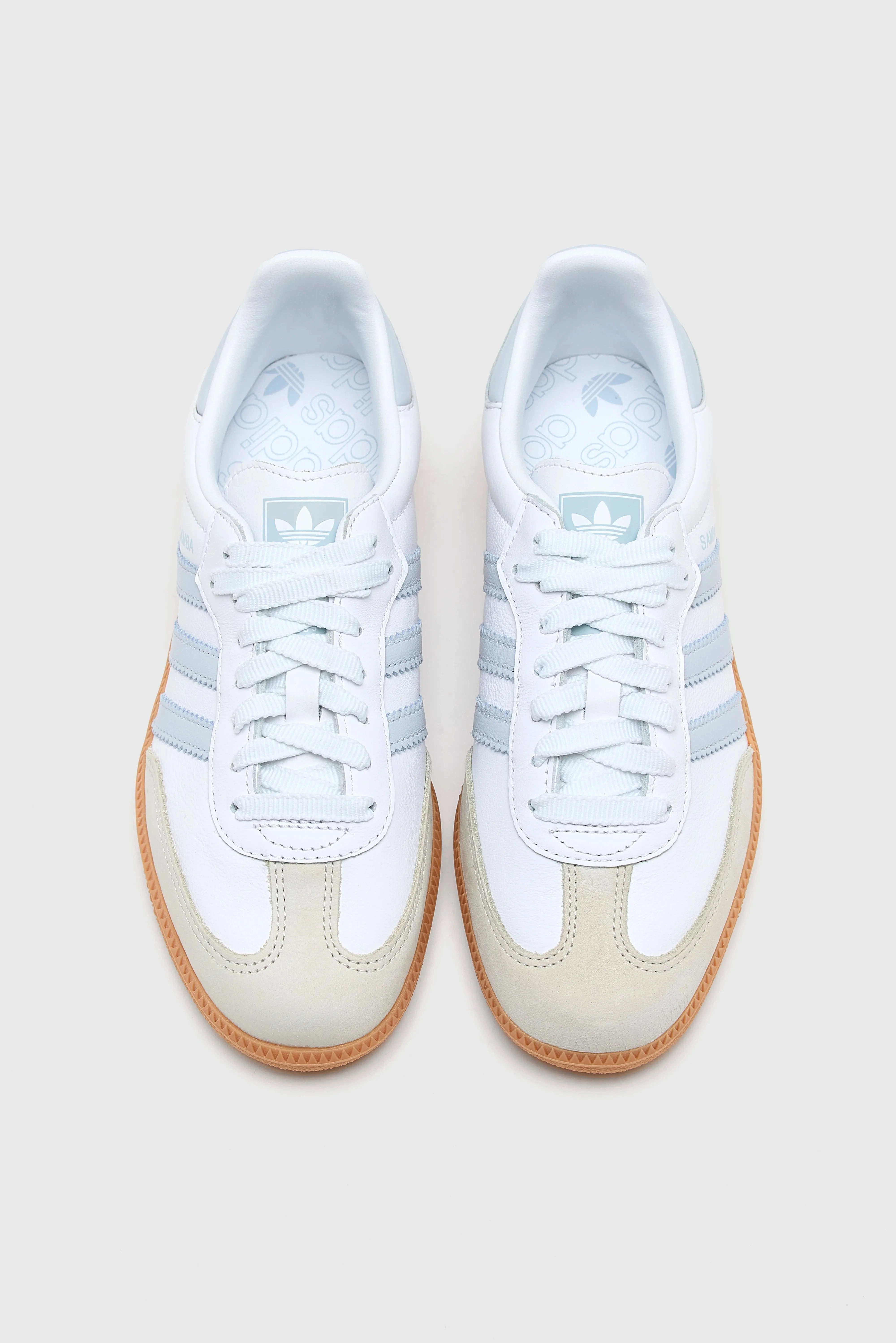 Samba OG for Women (251 / W / WHITE) professional athletes running in a frozen lake area shoes